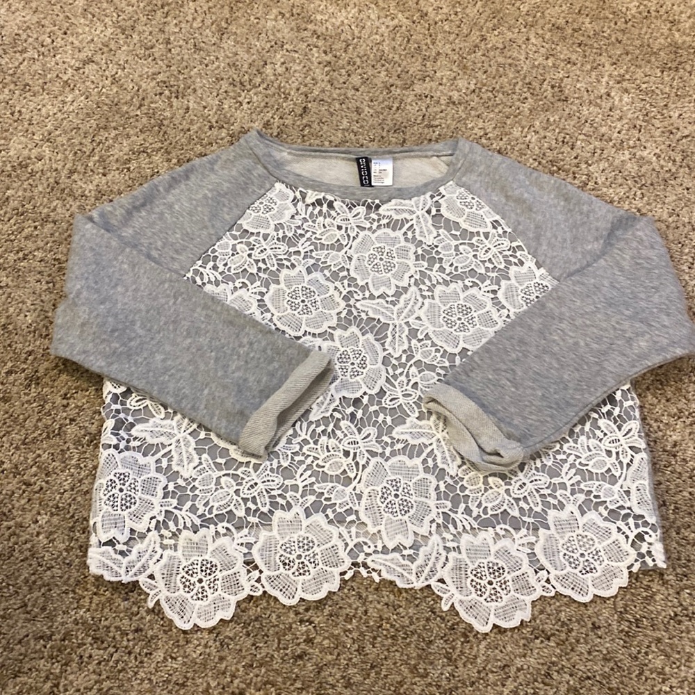 gray and white lace sweater
